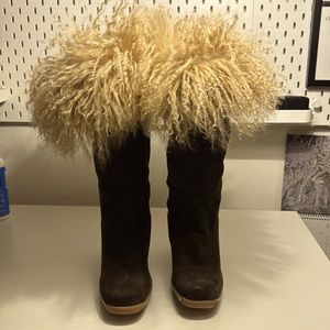 Brown suede and fur wedge boot with rubber bottom. Fully lined.